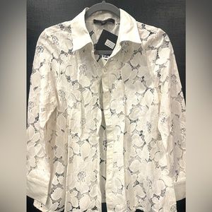 Off white colored sheer flowered blouse